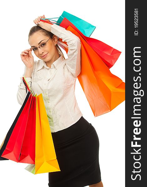 Businesswoman with shopping bags over white. Businesswoman with shopping bags over white