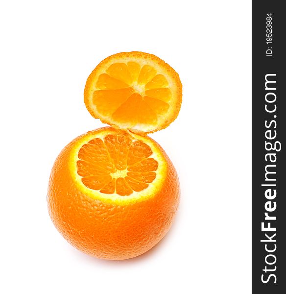 Opened ripe tangerine isolated on white background