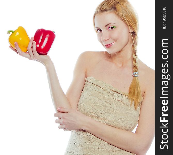 Woman With Yellow And Red Peppers