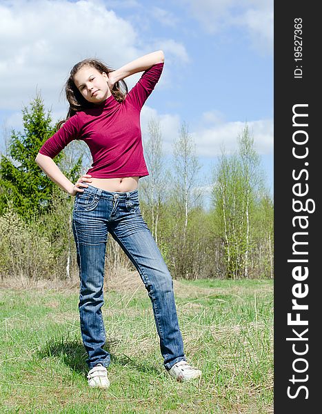 Portrait of the girl against the sky outdoor