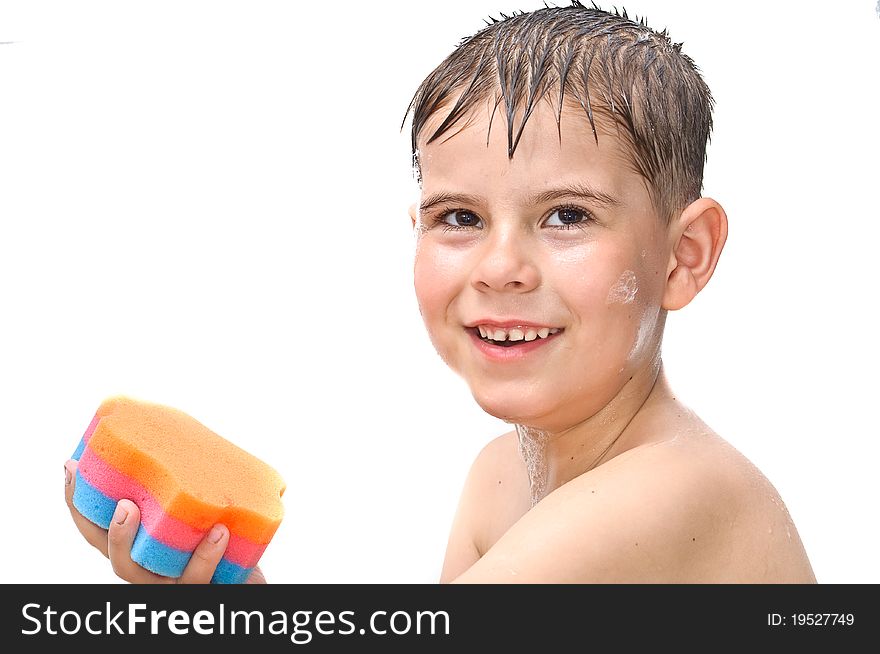 A boy swims in the bathtub. Isolated on white background picture