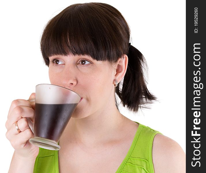 The young woman drinks coffee