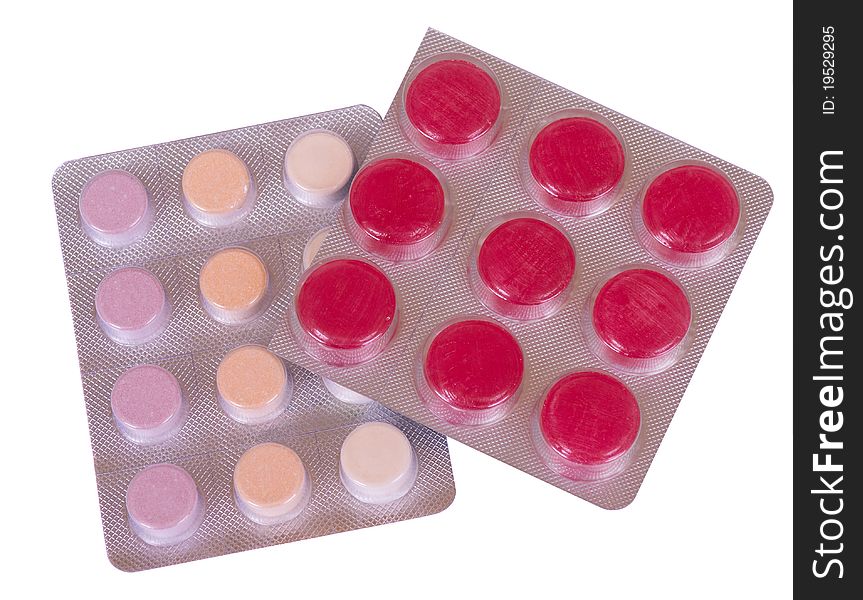 Image of a pills blister getting out form the box over white background. Image of a pills blister getting out form the box over white background.