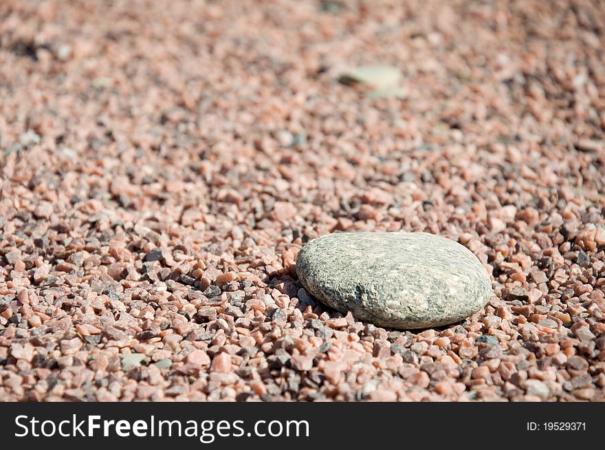 Macro of alone stone on gravel