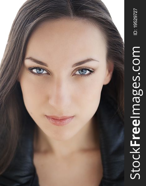 Portrait of the young beautiful girl in a leather jacket