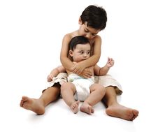 Free Little Kid Taking Care Of His Brother Stock Image - 19535501