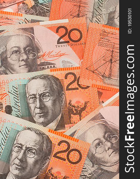 Multiple Australian twenty dollar ($20) banknotes scattered down on top of each other to create a background. Multiple Australian twenty dollar ($20) banknotes scattered down on top of each other to create a background