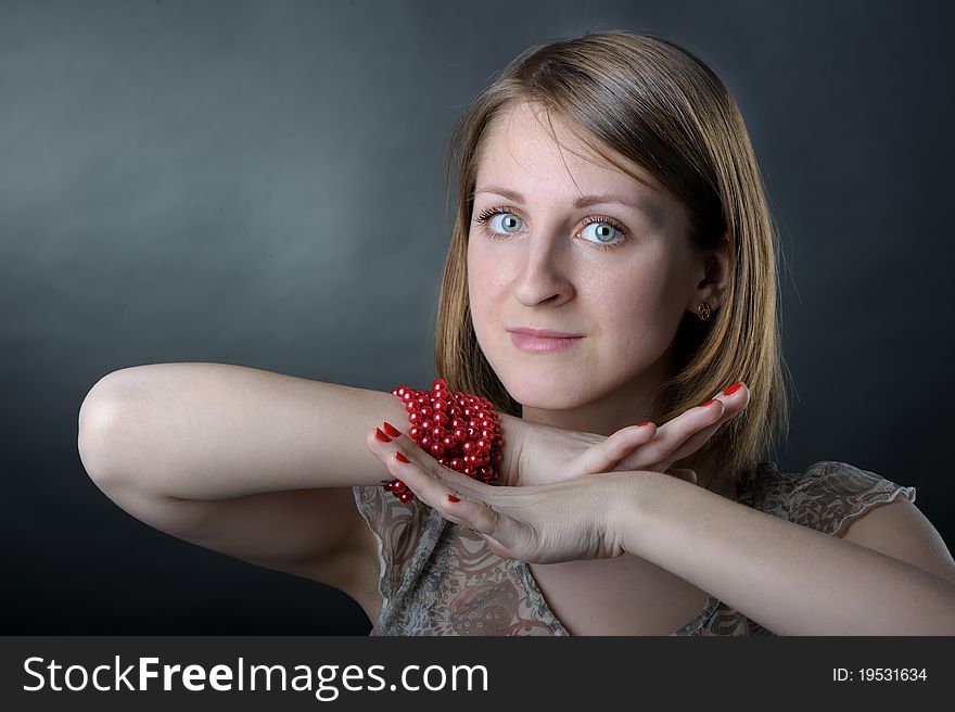 Slim girl in studio on black background