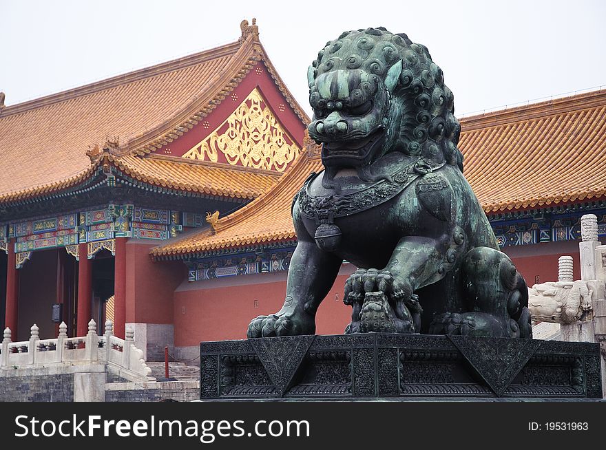 A copper sculptor of chinese lion at national palace museum in beijing. A copper sculptor of chinese lion at national palace museum in beijing