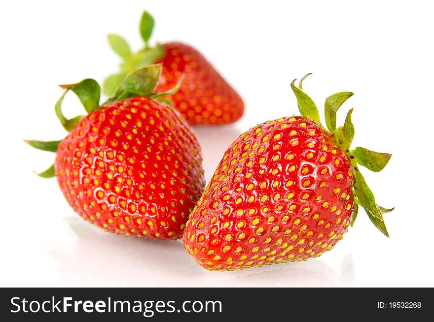 Three strawberries isolated on white background. Three strawberries isolated on white background