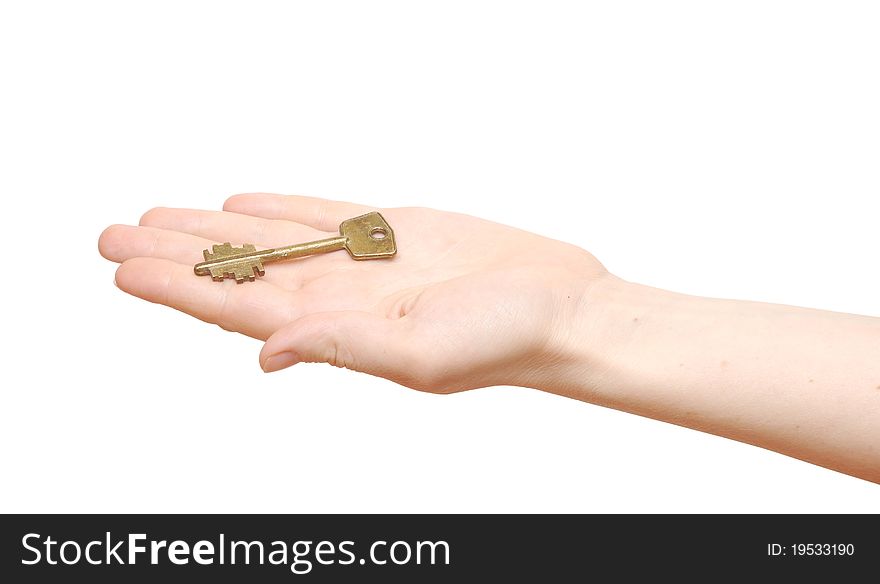 Old key in hand woman isolated on white background