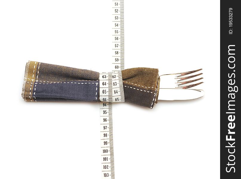 Knife and fork in textile napkin. diet healthy food