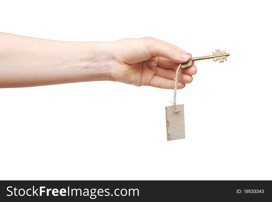 Hand and key with blank label isolated on white background