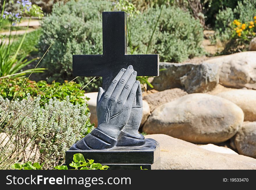 An old cross shaped tombstone in Riverside,CA. An old cross shaped tombstone in Riverside,CA.