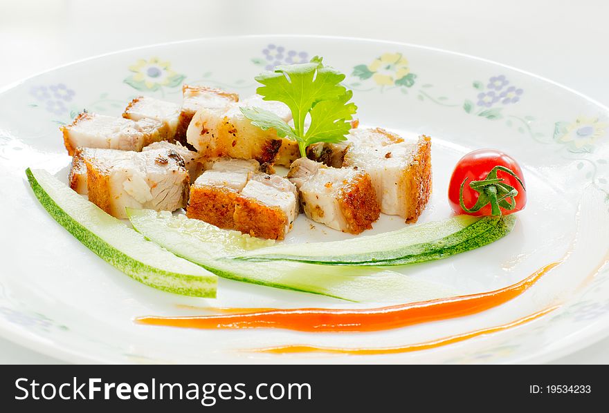 Traditional Chinese roasted pork on plate