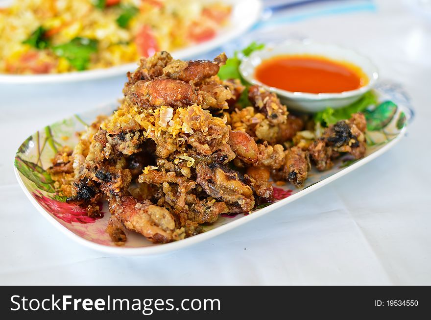 Deep fried squid with garlic and chili sauce , Thai style food