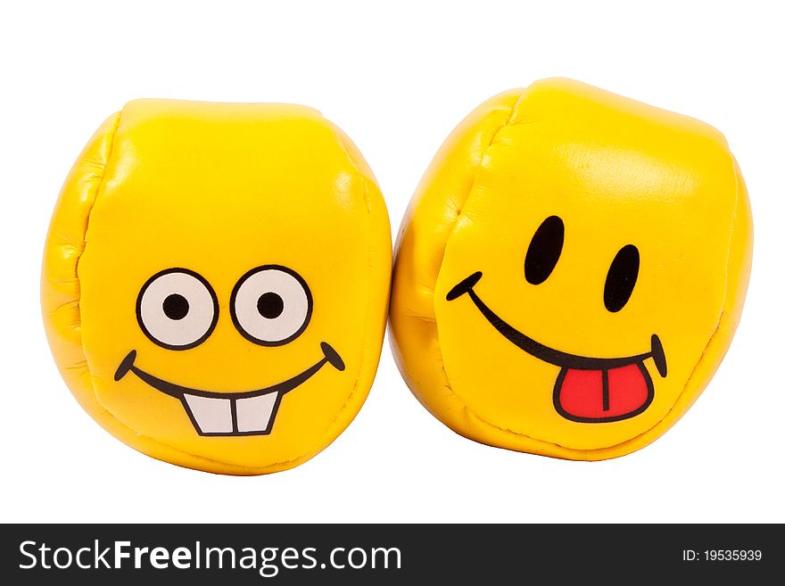 Yellow balls with funny grimaces. Yellow balls with funny grimaces
