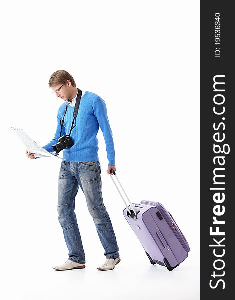 A young man with a suitcase on a white background. A young man with a suitcase on a white background