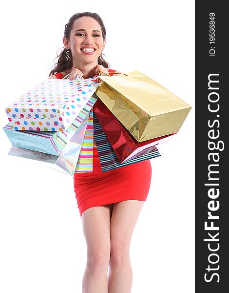 Excited beautiful smile from sexy young caucasian woman, holding up shopping gift bags. Model is wearing a short red dress. Excited beautiful smile from sexy young caucasian woman, holding up shopping gift bags. Model is wearing a short red dress.