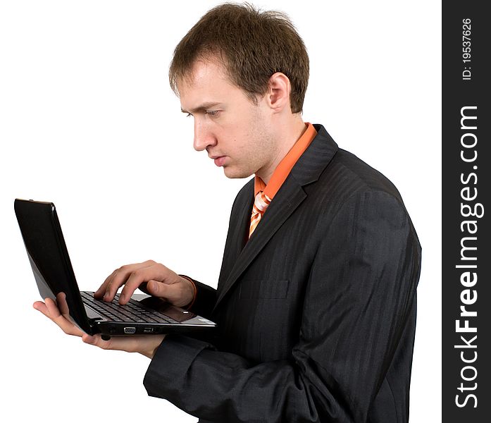 The young businessman with a laptop. The young businessman with a laptop