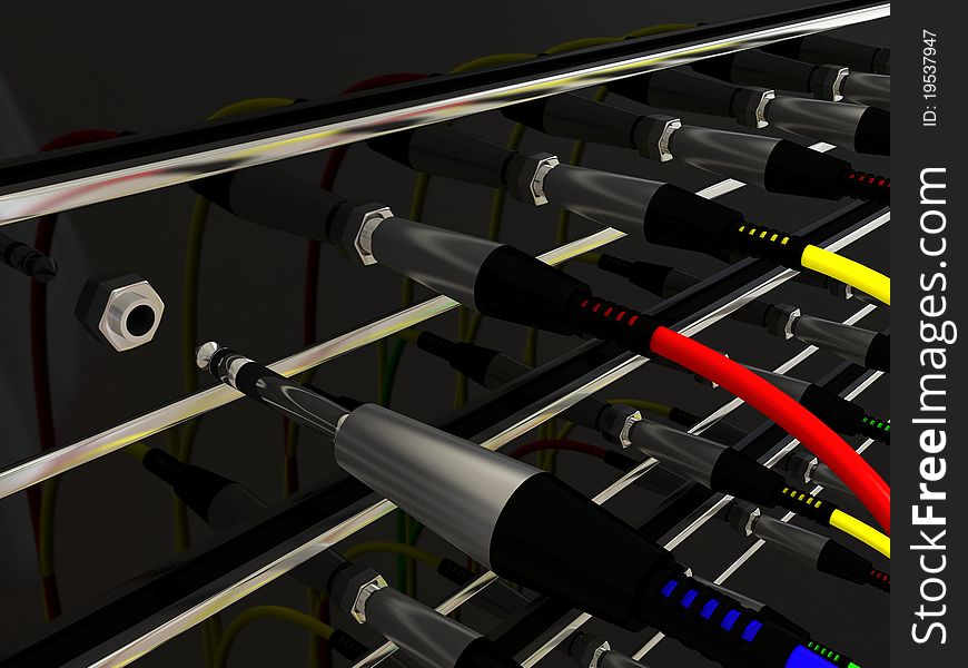 Several colored wires with jack plugs in the sockets. Several colored wires with jack plugs in the sockets