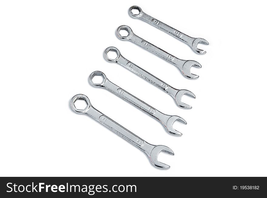 Five wrenches against a white background. Five wrenches against a white background