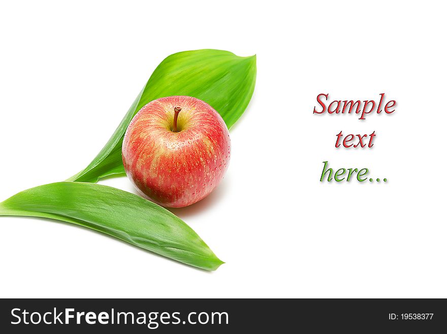 Apple and big leaves isolated on white