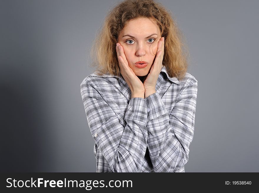Young woman looking shocked