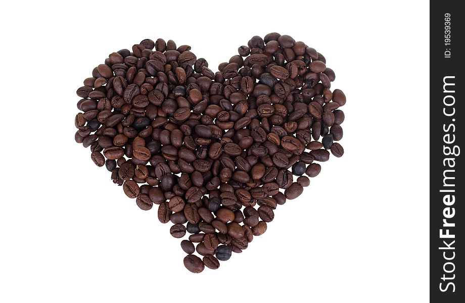 Perfect love heart made from delicious dark roasted coffee beans. Perfect love heart made from delicious dark roasted coffee beans