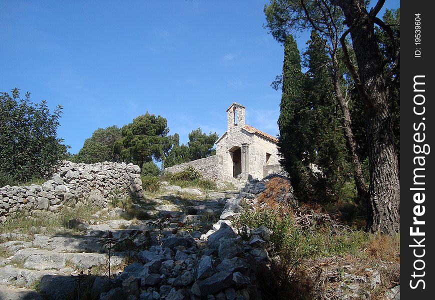 Old stone church on the hill near Hvar town in Croatia