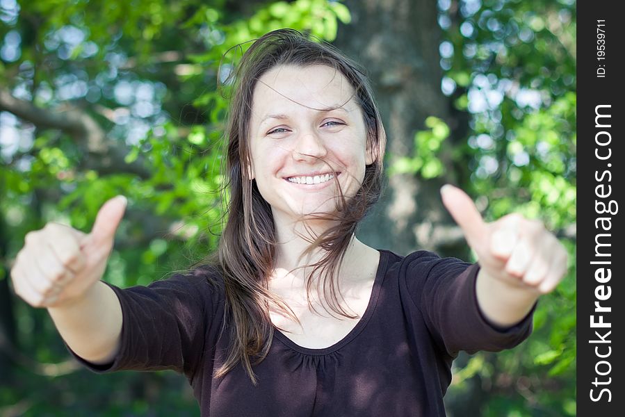 Woman Showing Thumbs Up.