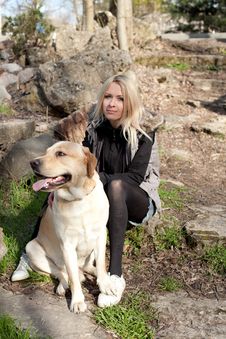 Beautiful Woman With Dog In The Park Stock Images