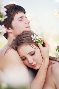 Beautiful Young Couple Kissing In The Flowering Ga Royalty Free Stock Photo Beautiful Young Couple Kissing In The Flowering Ga Royalty Free Stock Photo