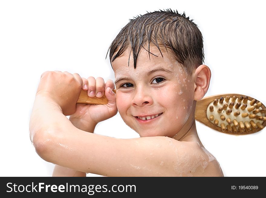 A boy swims in the bathtub. Isolated on white background picture