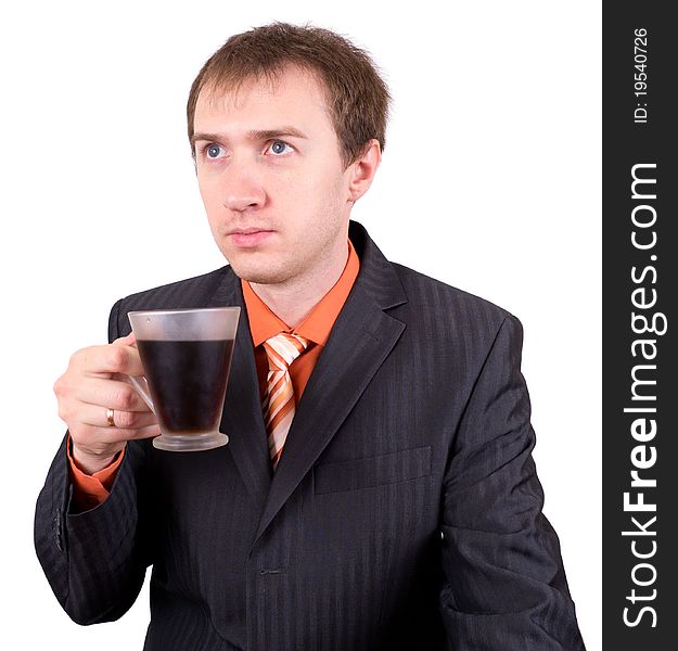 The Young Businessman Drinks Coffee.