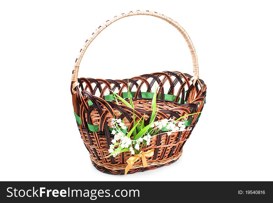 Wicker basket isolated on a white background