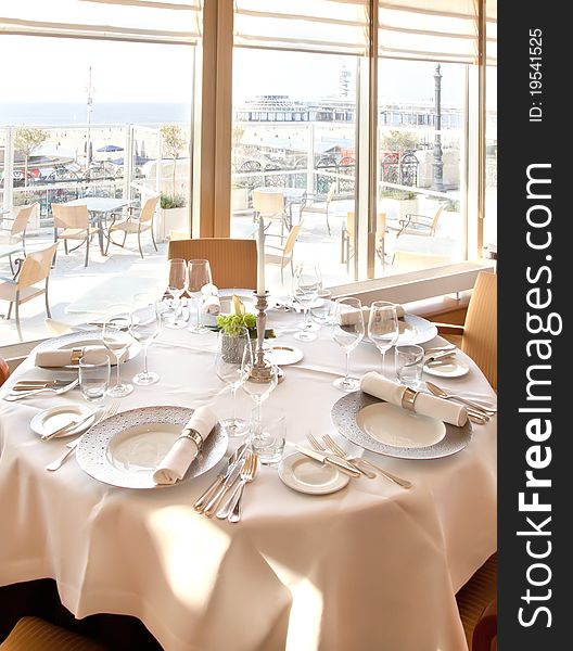 Cafe window with sea view by table. Cafe window with sea view by table