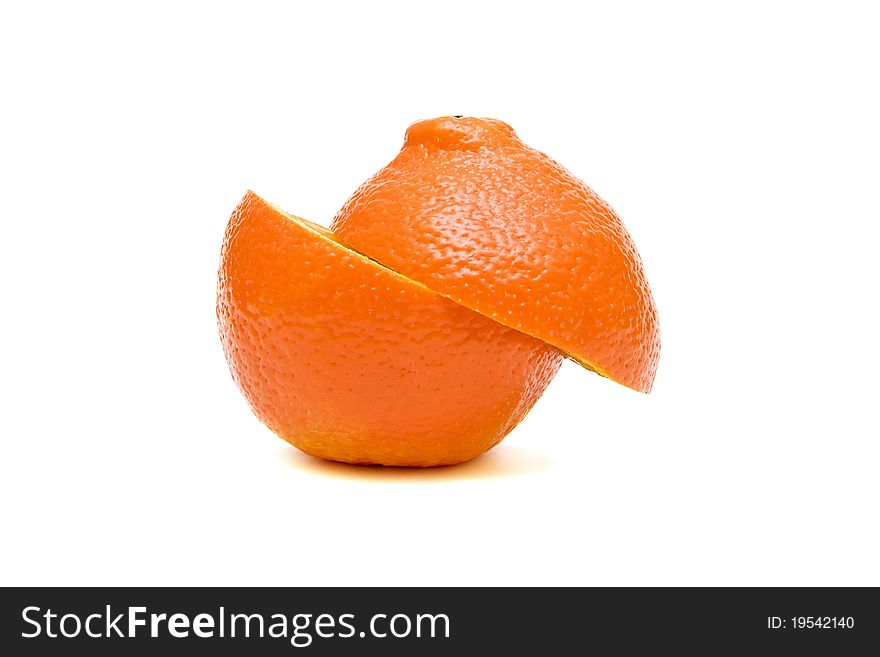 Ripe oranges cut in half on a white background. Ripe oranges cut in half on a white background.