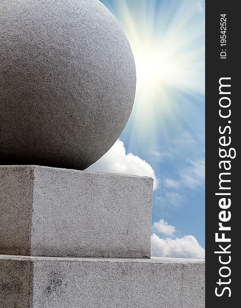 Sphere of the granite monument against the sky. Sphere of the granite monument against the sky