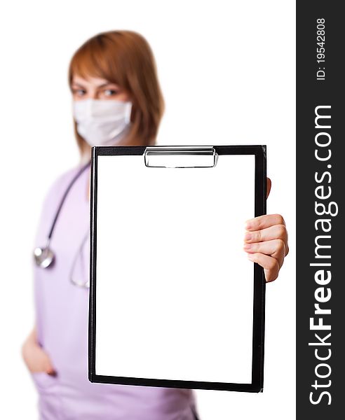 A portrait of young european doctor holding a whiteboard (selective focus). A portrait of young european doctor holding a whiteboard (selective focus)