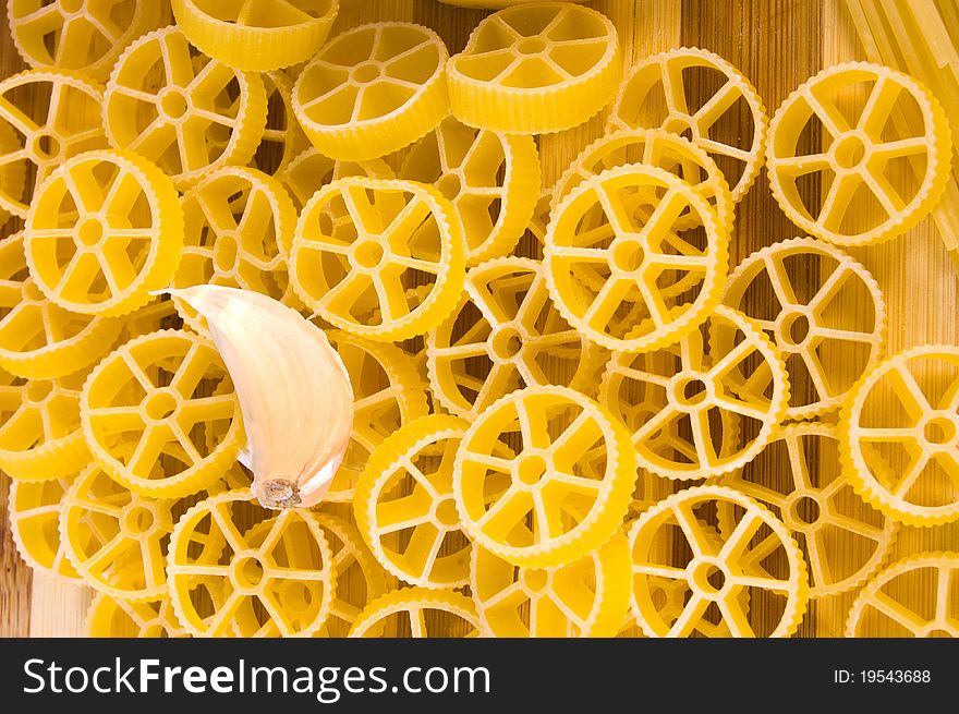 Background of italian pasta and garlic close-up shot