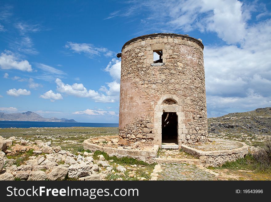 Old windmill against a striking sky