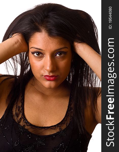 A young asian woman posing isolated on a white background.