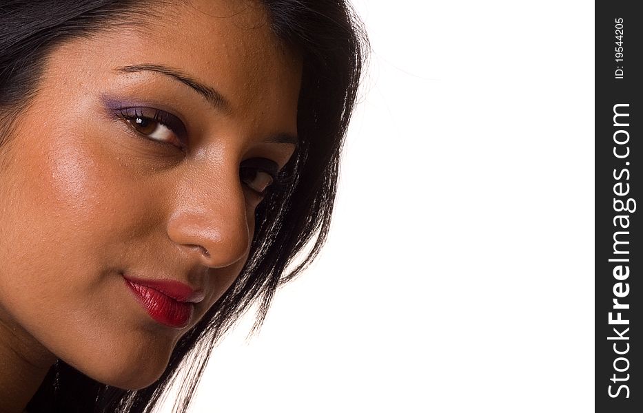 A headshot of a young asian woman isolated on a white background.