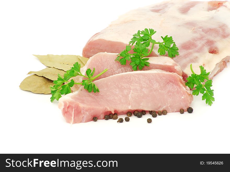 Pieces of crude meat with parsley and fennel