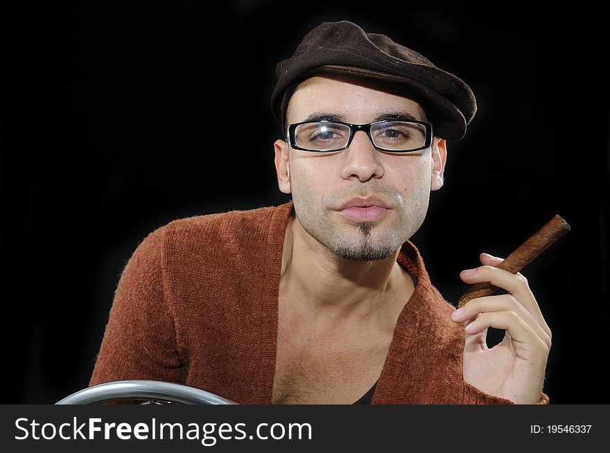 Man Holding Cigar Isolated On Black