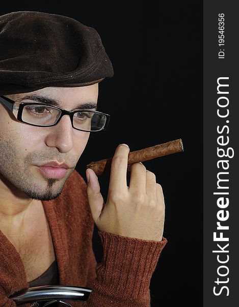 Man Holding Cigar Isolated On Black