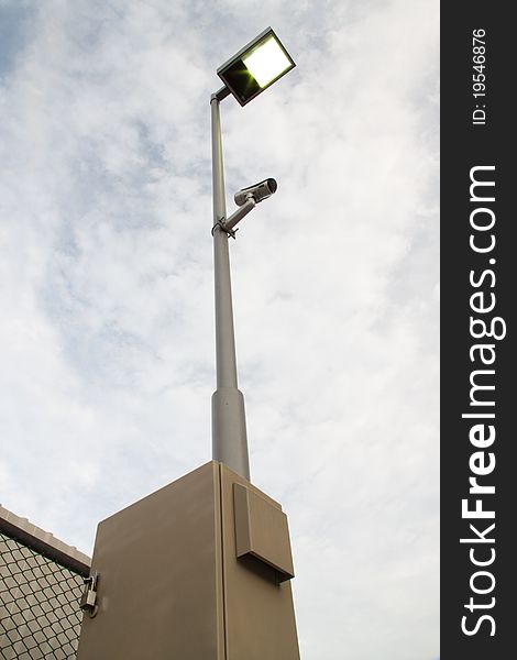 Electricity Post And Video Camera On Footpath