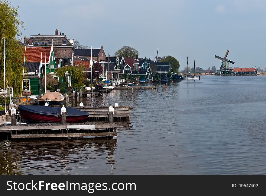 Windmill landscape in the Netherlands . Windmill landscape in the Netherlands .