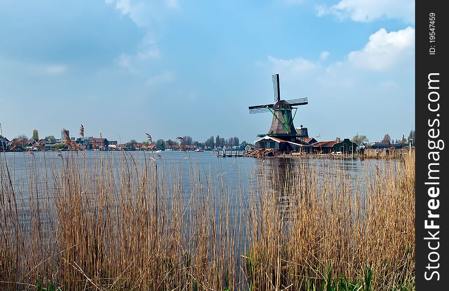 Windmills landscape in the Netherlands . Windmills landscape in the Netherlands .